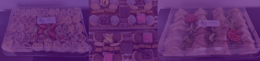 Banner consisting of sandwiches, sweet treat board with cakes and platter of wraps for catering in Stirling